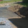 Installing Geo-grid to create a LIFETIME RETAINING WALL